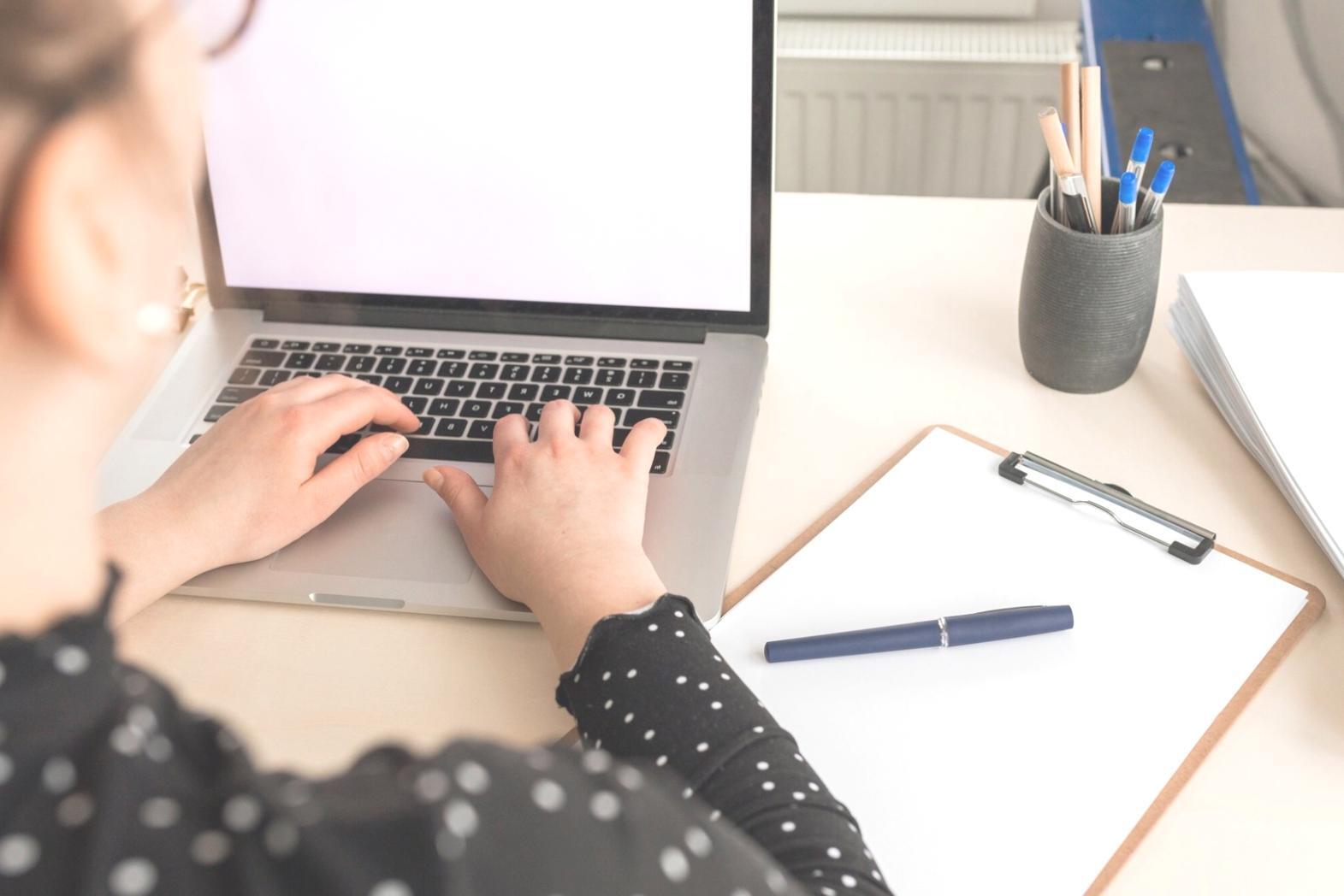 Modern financial analysis workspace with charts and data